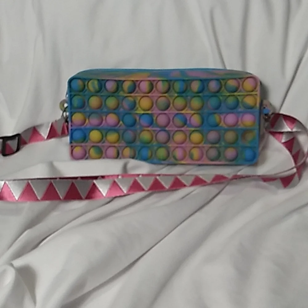 7.5 x 3.5 x 1 3/8 inches Rainbow Pop It Bag